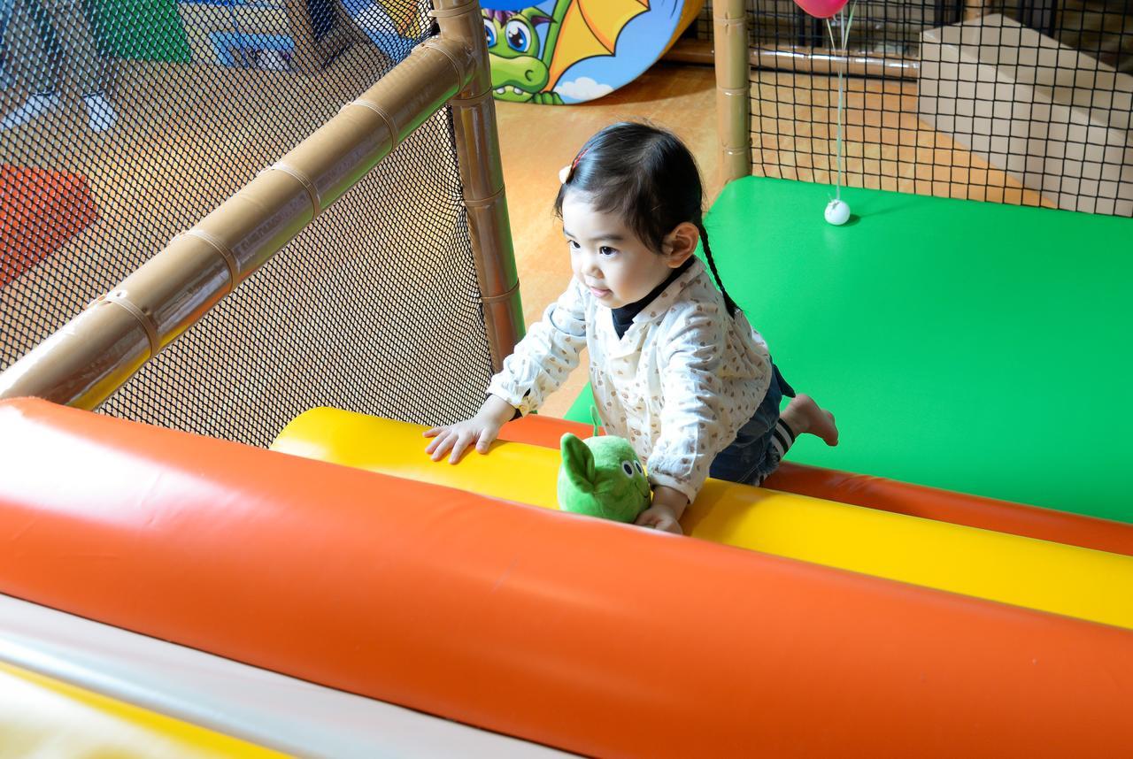 Cuncyue Hot Spring Resort Luodong Εξωτερικό φωτογραφία A child playing at a playground